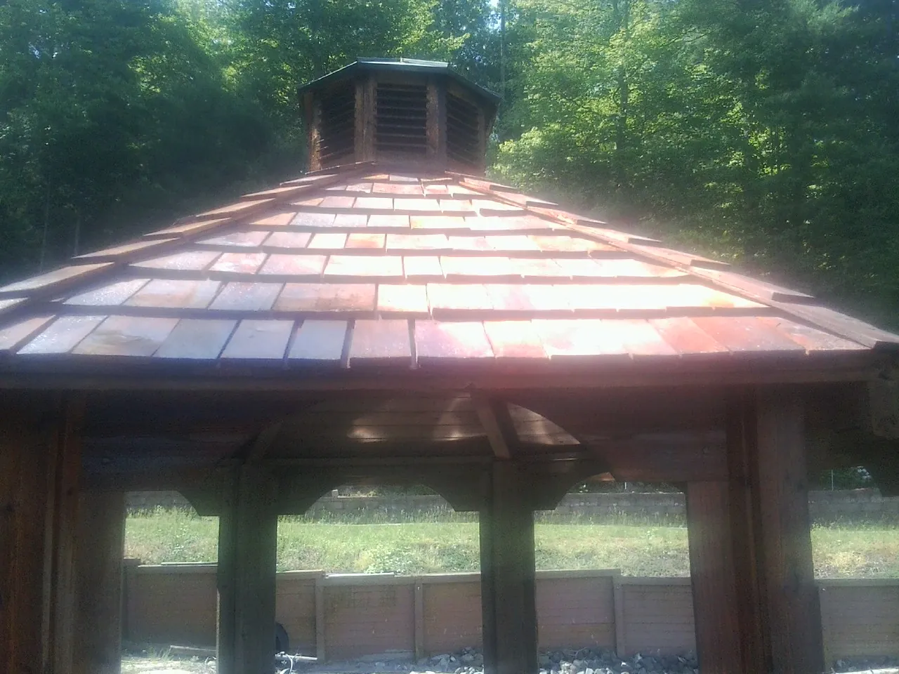 New cedar shake roof and cupola on a lakeside gazebo in Satsop